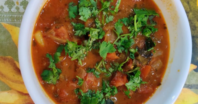 Tomato curry with roasted channa dal